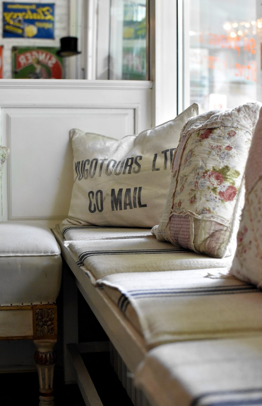 Finjak cafe in Zagreb, decorative pillows made of vintage canvas mail bags