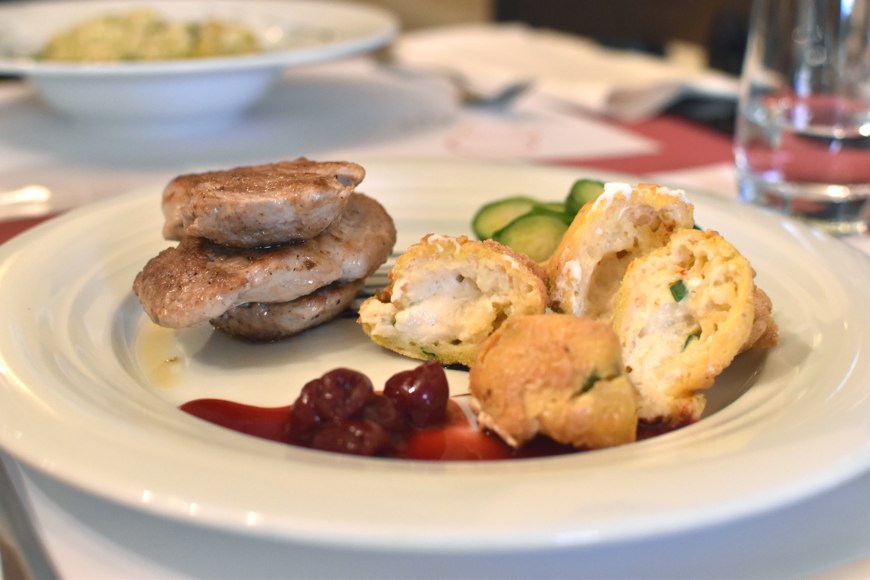 Seared pork tenderloin with potato croquettes at Trilogija